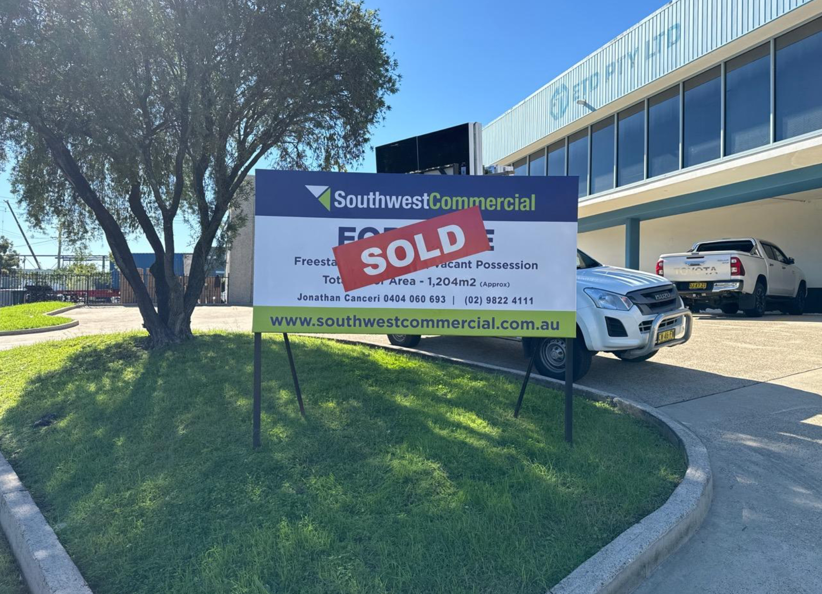 Sold Southwest Commercial sign outside an industrial property